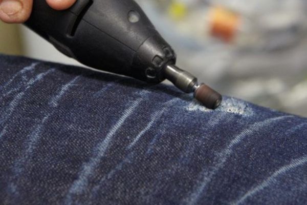 Jeans Grinding Machine: Behind Crafting Distinctive Denim Look 1 Jeans Grinding Machine